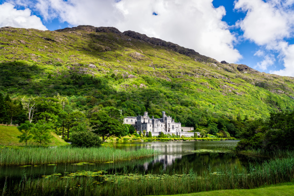 kylemore abbey with reflection in lake