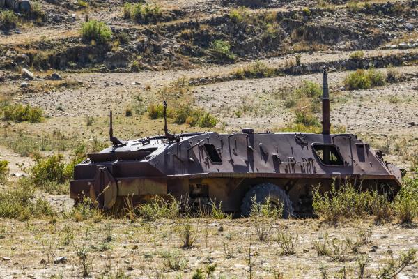 rusting military transport vehicle adi