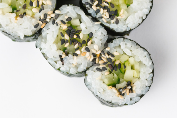 sushi with cucumber and sesame seeds