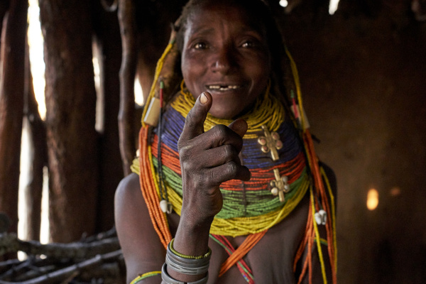traditional muhila woman pointing with her