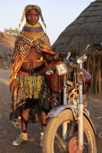 proud muhila woman and her bike
