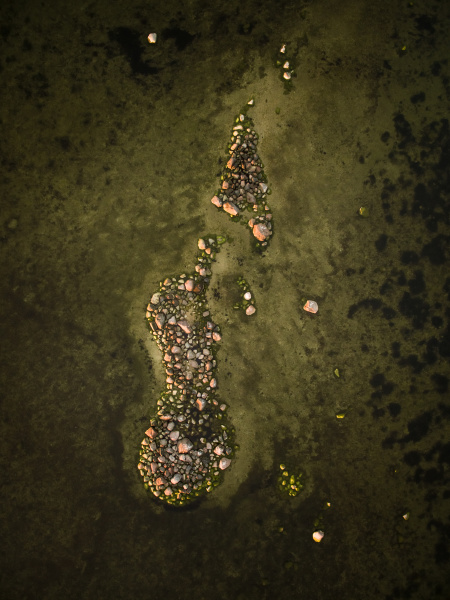 aerial view of rocks emerging from