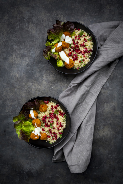 bowls of falafel with lettuce