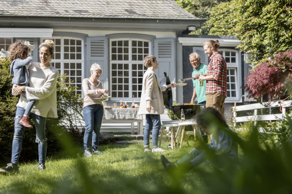 extended family having a barbecue in