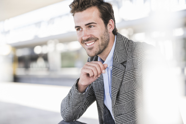 portrait of smiling young businessman at