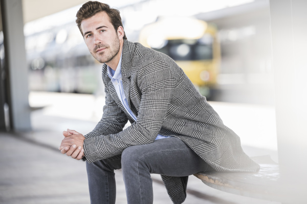 portrait of young businessman sitting at