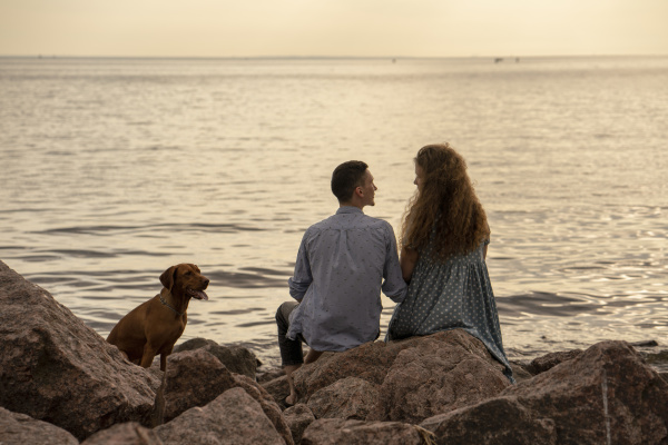 young couple with dog at the