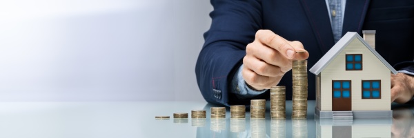 businessman s hand placing coins