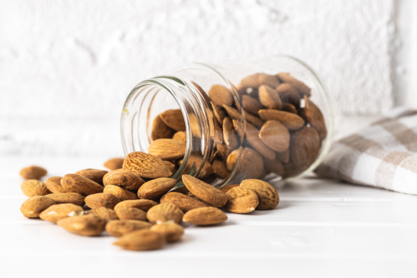 dried almonds nuts in jar