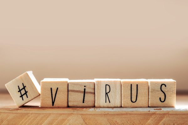 the word virus on wooden cubes