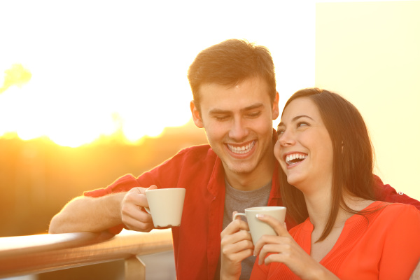 happy, couple, enjoying, coffee, at, sunset - 28277914