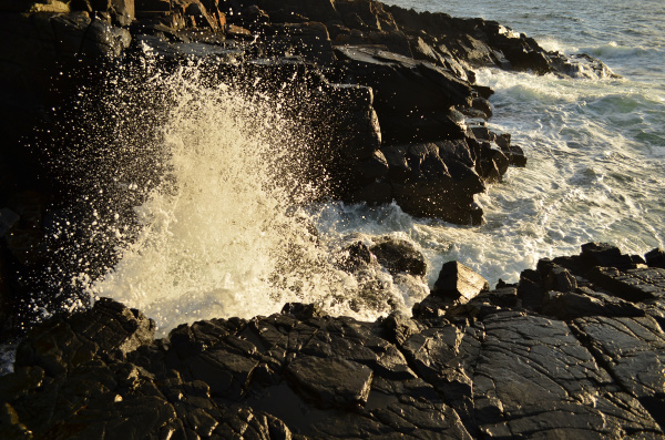 waves splashing on the rocks on