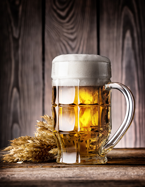 faceted, mug, of, light, beer, with - 28278840
