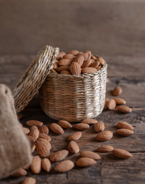 almond, in, basket, on, blurred, wooden - 28279714