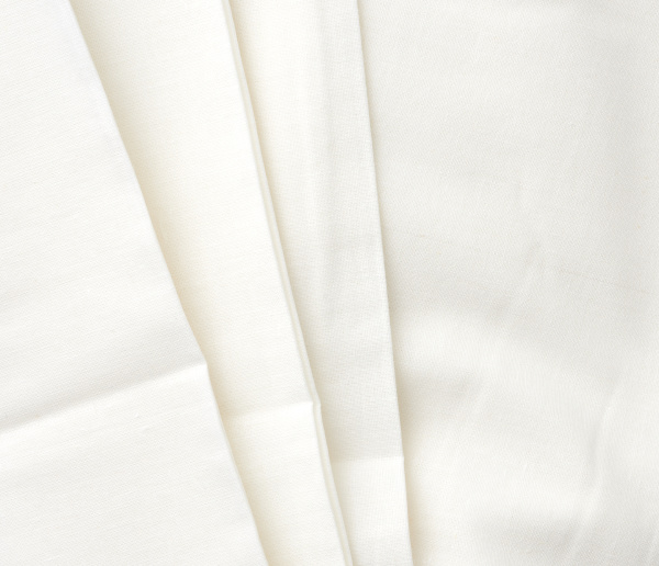 white cotton fabric folded full