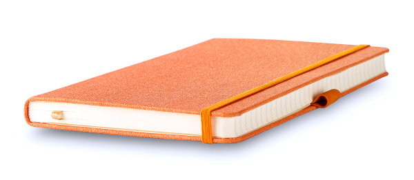 notebook with an orange cover