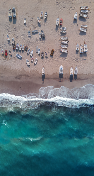 aerial view of many boats ashore