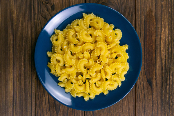 pene lisce pasta in blue plate