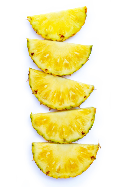 fresh pineapple slices on white background