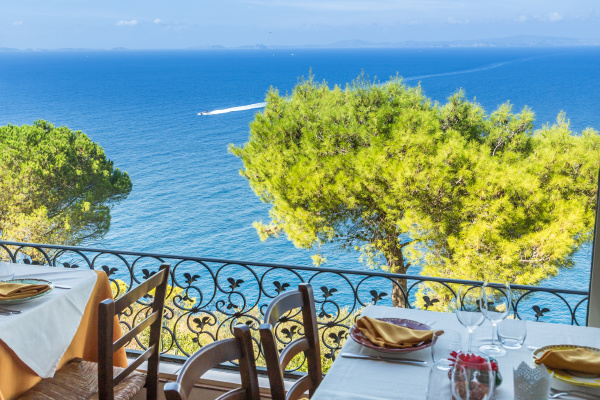 restaurant table overlooking the sea on