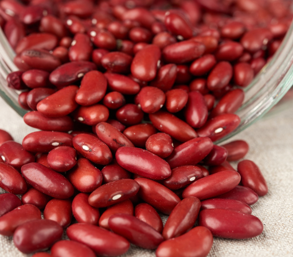 scattered red raw beans from a