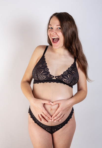 young beautiful pregnant woman with long