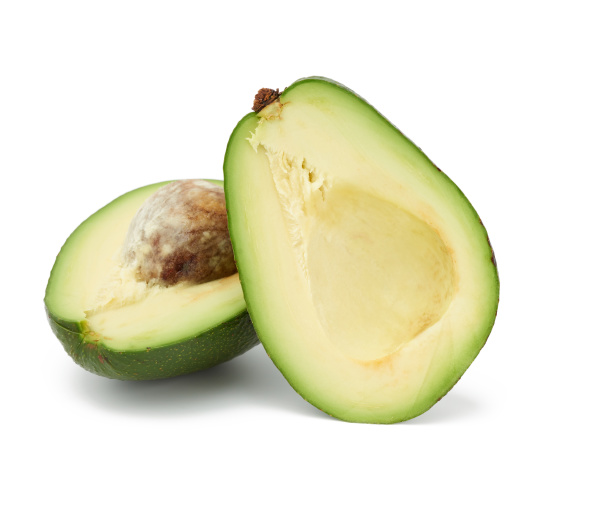 green avocado fruit isolated on white