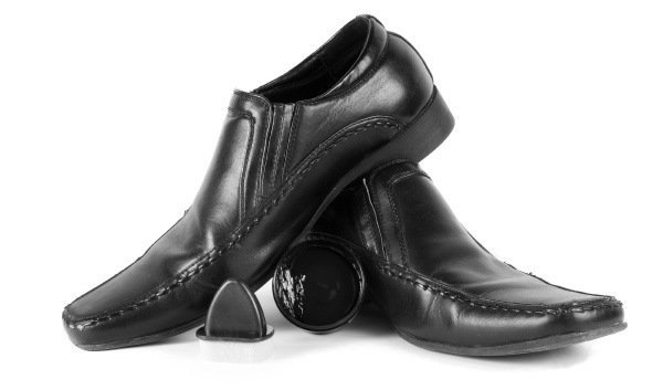 male black shoes with cleaning wax