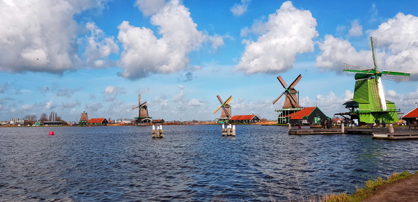 windmills and houses travel in