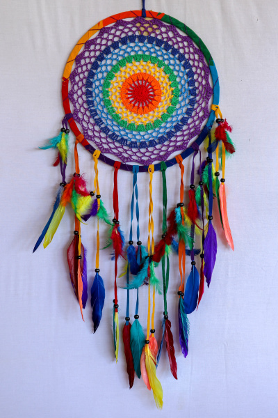 beautiful multicolored handmade dreamcatcher on white