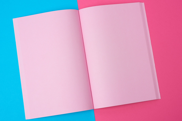 open notebook with blank pink pages