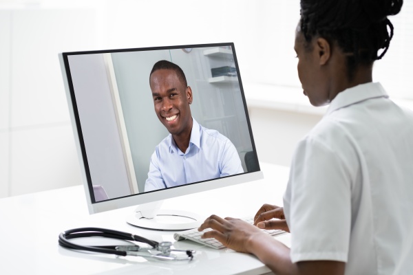african doctor in video conference call
