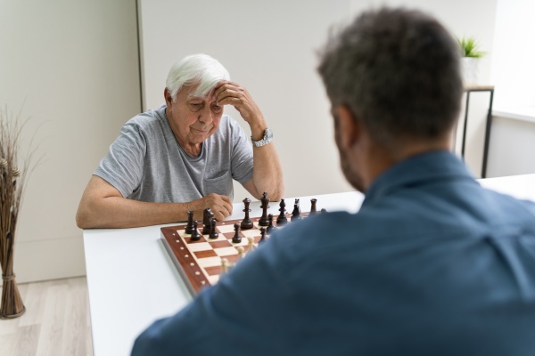 elderly senior playing chess