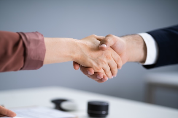 recruit manager handshake at job interview