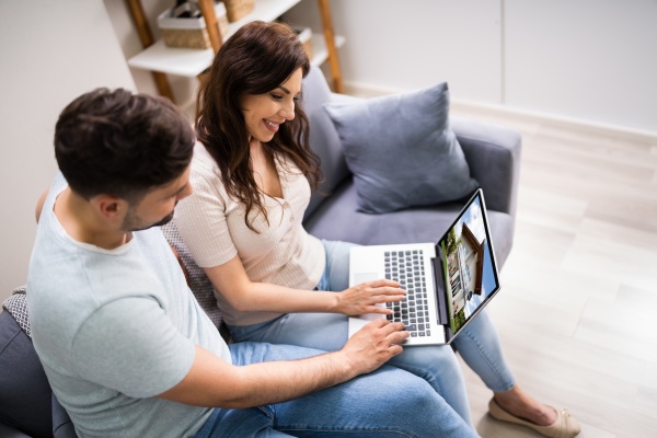 couple family searching real estate online