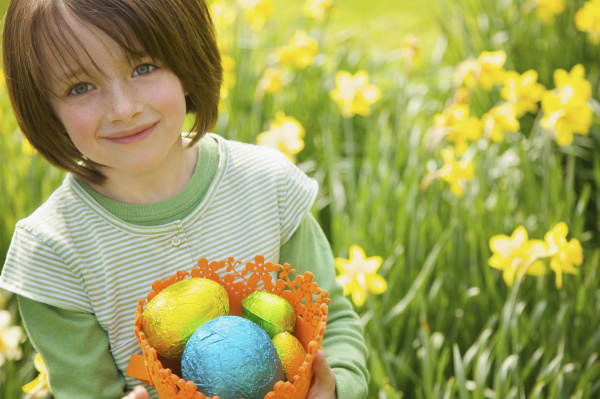 portrait smiling girl with easter egg