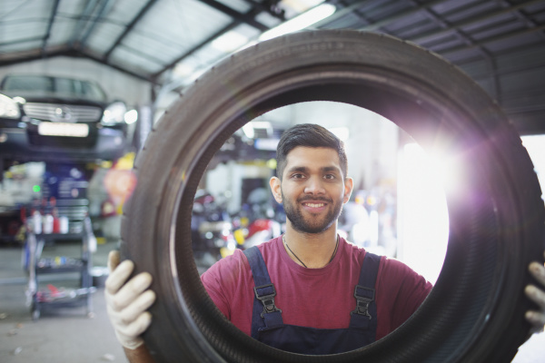 portrait confident smiling male mechanic