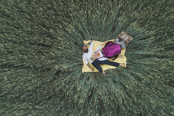 aerial view of mature couple lying