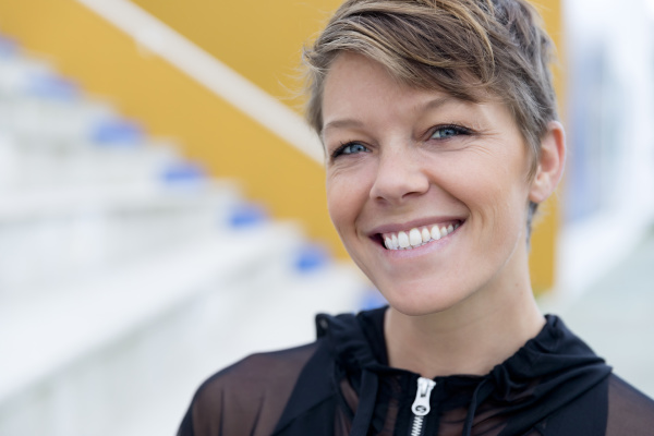 portrait of smiling athletic woman
