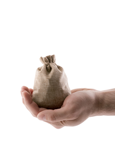 hand with linen sack isolated on