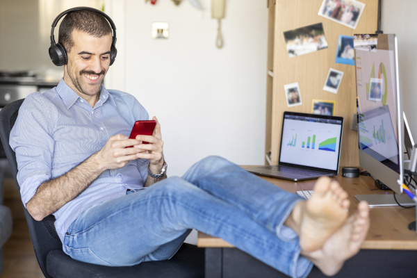 man working from home taking