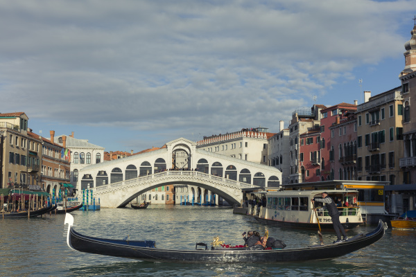 a gondola crossing the grand canal