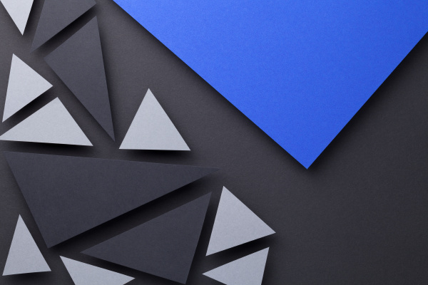 modern triangular shapes composition over black