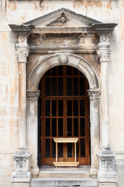 portal of little old church in