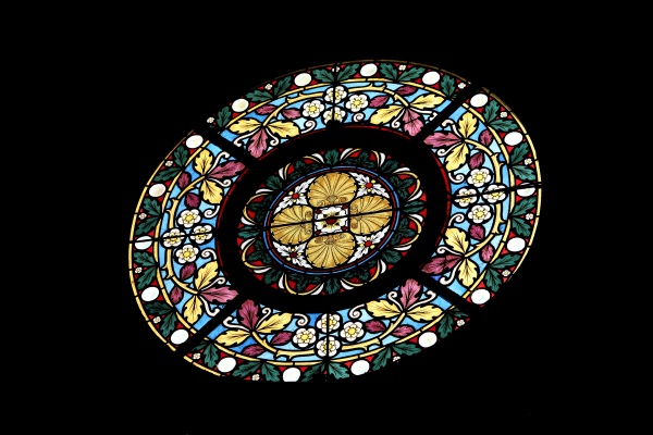 stained glass window in basilica assumption