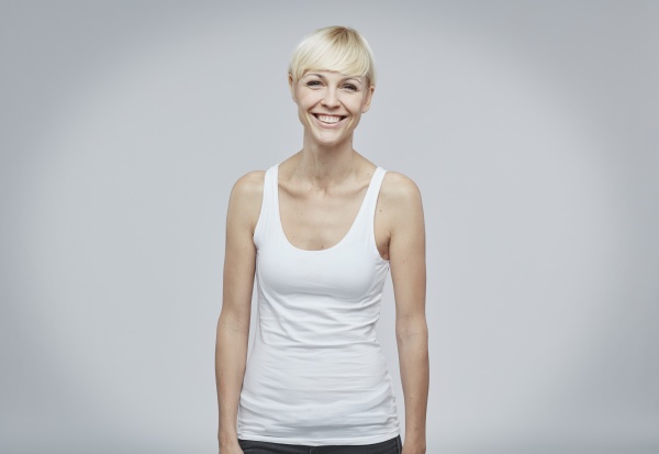 portrait of happy blond woman wearing
