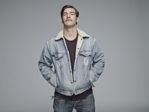 portrait of man wearing jeans jacket