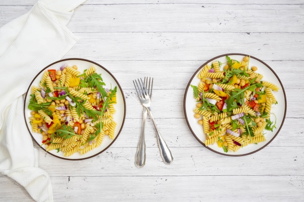 two plates of vegetarian pasta salad