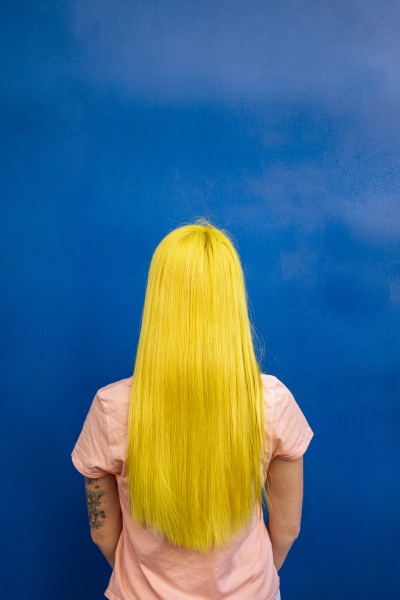 long hair woman looking at blue