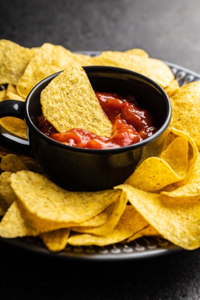 tortilla chips and red tomato salsa